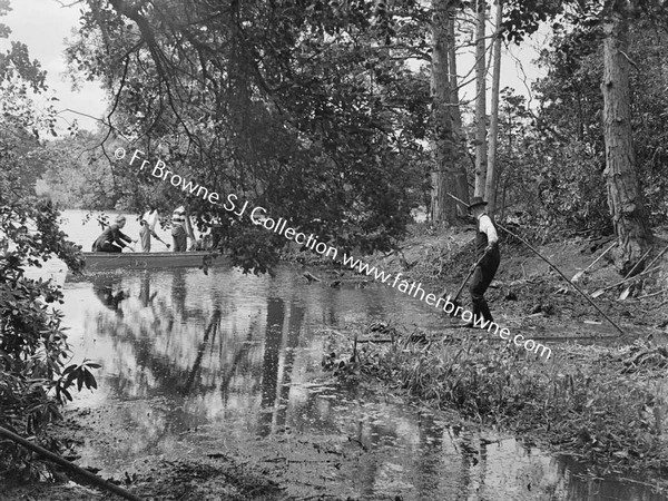 AT THE LAKE CLEARING THE CHANNEL AT THE BACK OF THE ISLAND